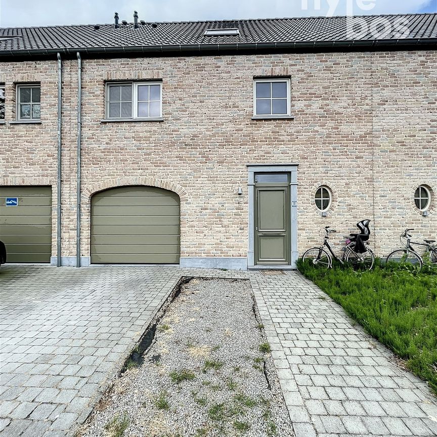 Instapklare woning met 3 slaapkamers, garage en aangename stadstuin - Foto 1