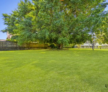 Spacious Three-Bedroom Unit in Convenient Location - Photo 1