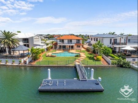 Stunning Canal-Front Home with Pontoon â Convenience Meets Lifestyle - Photo 5