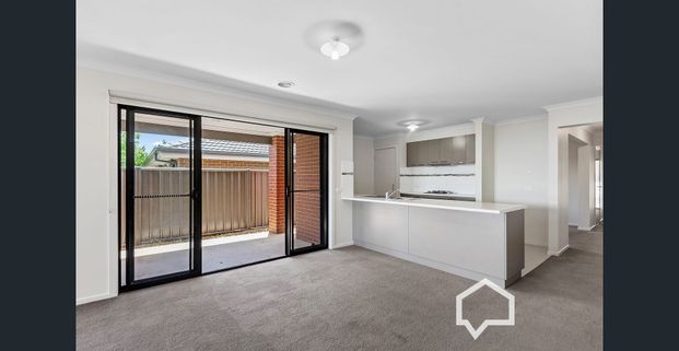 Four-Bedroom Home with Open Living and Double Garage - Photo 1