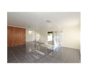 Deceptively Spacious Family Home with Multiple Living Areas - Photo 2