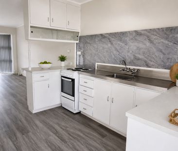 Freshly Renovated 3-Bedroom Unit in a Prime Location - Photo 6