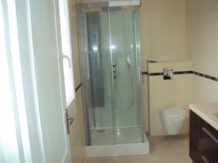 Location Appartement 4 pièces 128m² - Photo 3