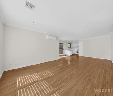 Stylish Town Residence with Indoor Outdoor Appeal - Photo 2