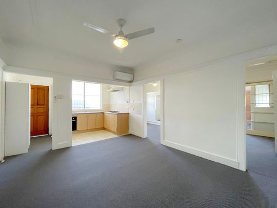 Perfectly Positioned Apartment with Unbeatable Convenience! - Photo 1