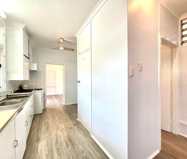 Spacious Three Bedroom Home with Double Parking on a Large Block in... - Photo 4