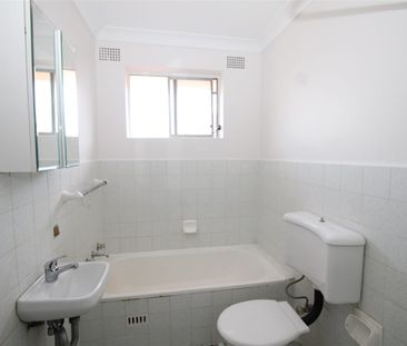 TOP FLOOR FRESHLY PAINTED AND RENOVATED TWO BEDROOM UNIT - Photo 2