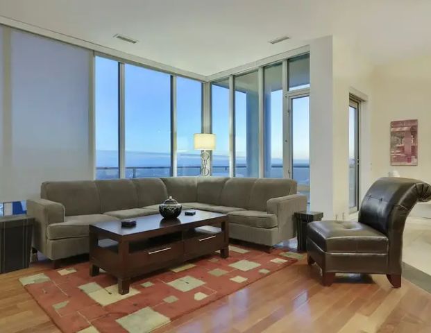 PENTHOUSE MOUNTAIN AND CITY VIEWS! FURNISHED! 2 INDOOR PARKING STALLS! | 1410 1 St SE, Calgary - Photo 1