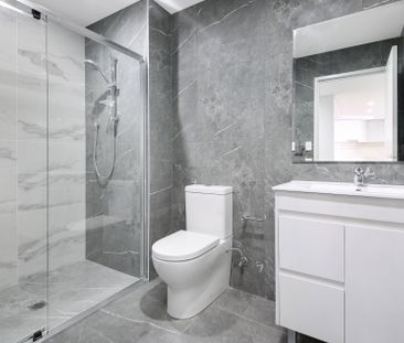 Modern two bedroom unit - 20% below market rent - Photo 4