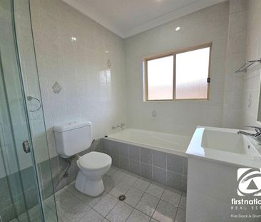 BEAUTIFULLY PRESENTED TOWNHOUSE WITH DOUBLE LOCK-UP GARAGE - Photo 5