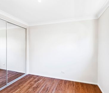 SPACIOUS FAMILY HOME IN A CONVENIENT WENTWORTHVILLE LOCATION - Photo 1