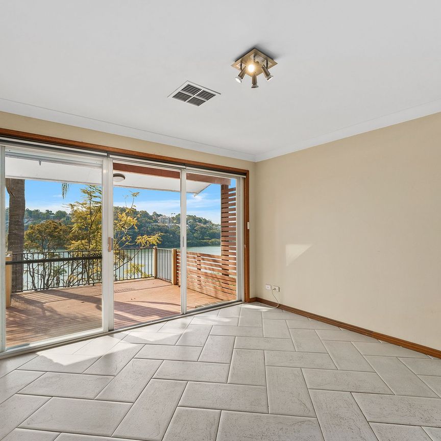 Peaceful Retreat with Stunning Water Views&excl; - Photo 1