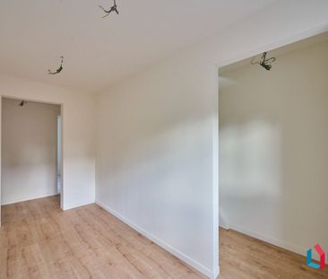 Aan de stadsrand gelegen volledig gerenoveerde woning met ruime woo... - Photo 6