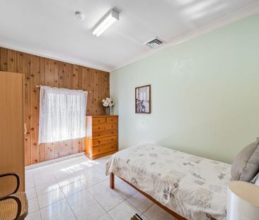 Charming Family Home in a Prime, Peaceful Location - Photo 5