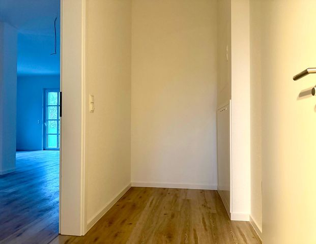 Neubau im Zentrum: 3-Zimmer-Obergeschosswohnung mit Südwest-Balkon! - Foto 1