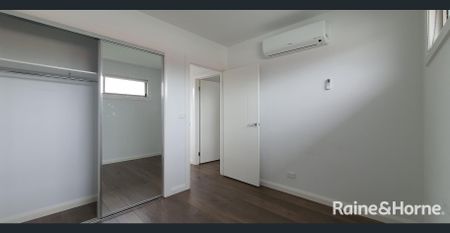 Modern Living in a Thriving Location! - Photo 3