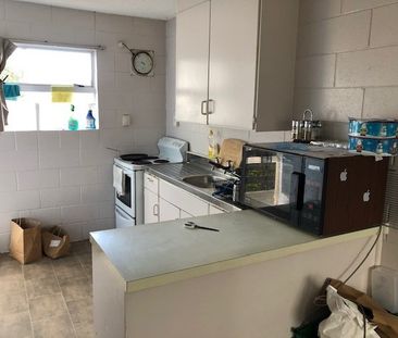 Tidy and spacious, this one-bedroom upstairs flat sits in a quiet b... - Photo 4