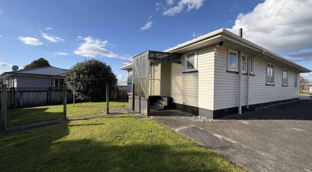Tidy 3-Bedroom Home with Great Indoor-Outdoor Flow - Photo 5