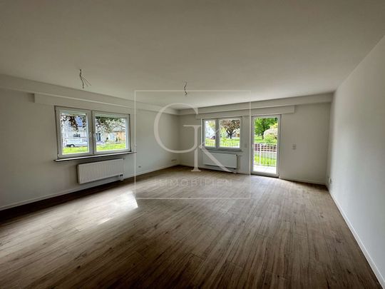 Erstbezug nach Modernisierung von lichtdurchfluteter großzügiger EG-Wohnung mit großem Süd-Balkon - Photo 1