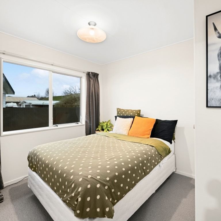 Modern and low-maintenance, this 3-bedroom, 1-bathroom home with a double garage is perfectly positioned on popular Sinclair Road in central Te Awamutu. - Photo 1