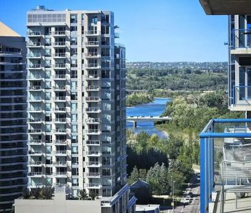 Bright & Spacious 2-Bed, 2-Bath Condo in Five West Tower II – Freshly Updated! | 910 5th Ave SW, Calgary - Photo 1