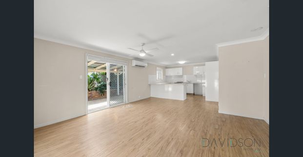 Picture-Perfect Cottage Living in Coomera Waters - Photo 1