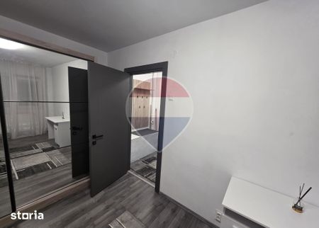 Apartament 2 camere parter inalt centrala gaz zona Dambovita - Fotografie 2