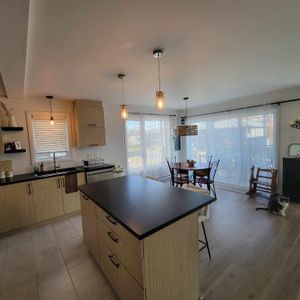 Appartement lumineux 4 1/2 domaine boisé - Photo 2