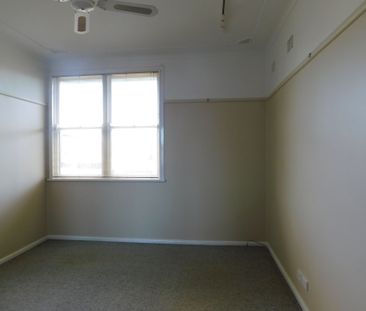 Charming Family Home with Spacious Backyard and Modern Comforts - Photo 1