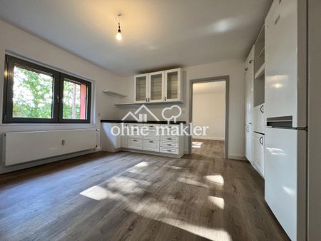 Schöne renovierte Souterrainwohnung mit großer Terrasse und Einbauküche - Photo 4