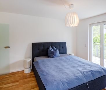 Timelessly modern apartment with green view - Photo 5