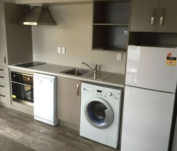 Furnished studio room featuring essential amenities such as a bed, ... - Photo 1