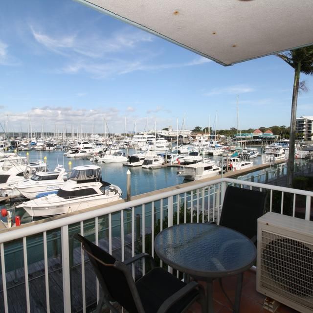 IDEALLY LOCATED 2-BEDROOM UNIT OVERLOOKING THE MARINA - Photo 1