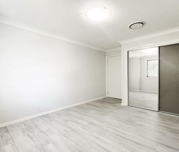 Modern Four-Bedroom Townhouse in Prime Location - Photo 2