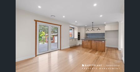 Renovated Charm with Modern Comforts and Sustainable Living - Photo 5