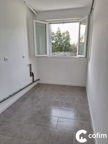 Appartement T3 avec jardin et garage - Photo 4