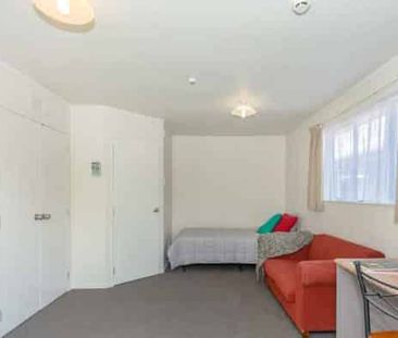 Sunny Upstairs Studio Unit with a Balcony - Photo 1