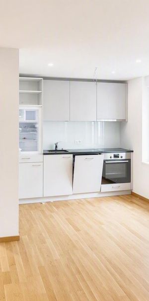 Moderne 1.5-Zimmer-Wohnung an zentraler Lage - Foto 1