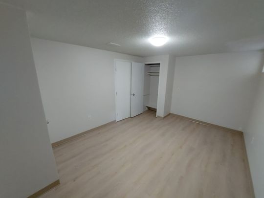 AVAILABLE NOW SPACIOUS 2 BEDROOM RENOVATED BASEMENT SUITE - Photo 1