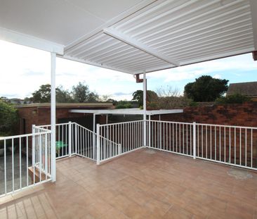 RENOVATED THREE BEDROOM BRICK HOME - Photo 4