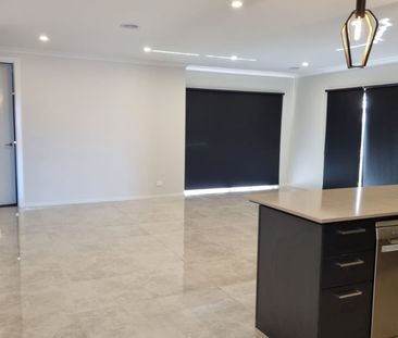 Modern Family Home with Spacious Living and Garage - Photo 3