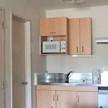 OFF STREET PARKING AND CENTRAL CITY LIVING! - Photo 1