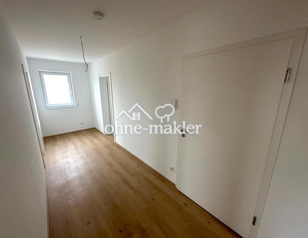 NEUBAU-ERSTBEZUG: 3-Zi-Wohnung mit EBK, Balkon & Stellplatz - Erlangen-Steudach - Foto 1