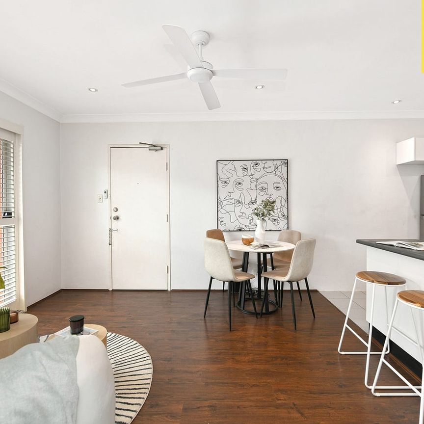 Stylish & Sun-Filled Living in a Convenient Location - Photo 1