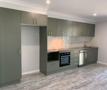 Near-new unit offering low-maintenance living - Photo 6