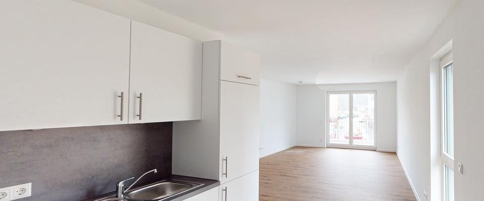 2-Zimmer-Neubauwohnung mit besonderem Schnitt! EBK und Balkon/Terrasse inklusive - Foto 1