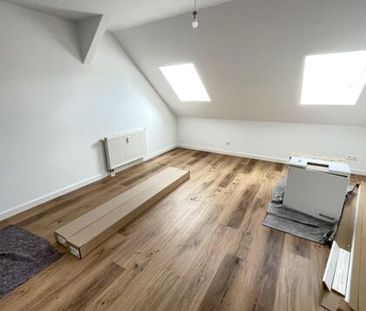 Helle Dachgeschosswohnung - Foto 4