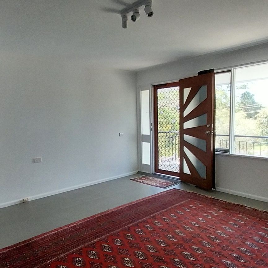 Conveniently Located updated Three-Bedroom Home with Fully Fenced Yard - Photo 1