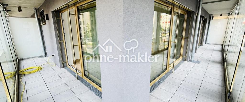 Erstbezug! Luxuriöse 2-Zimmer-Panoramawohnung mit Rundum-Balkon, EBK, TG-Stellplatz mit E-Ladesäule - Photo 1