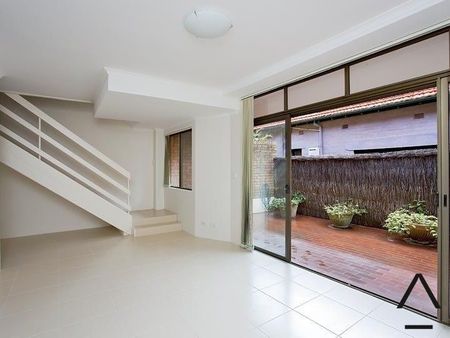 WELL MAINTAINED TWO STOREY TOWNHOUSE - - Photo 2